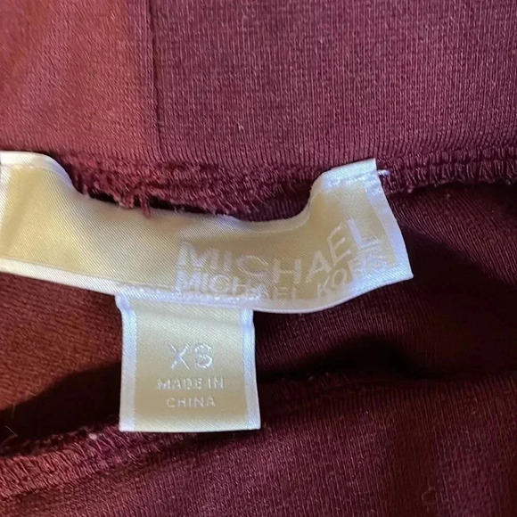 Michael Kors burgundy colored leggings size xs - Picture 3 of 4